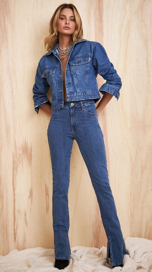 CALÇA JEANS FLARE ABERTURA BARRA